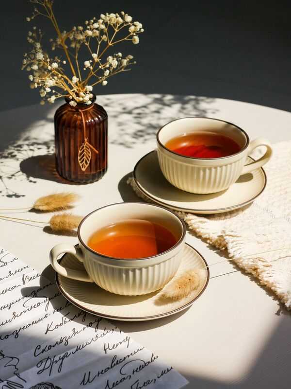 Warm cup of tea on a quiet table in soft natural light
